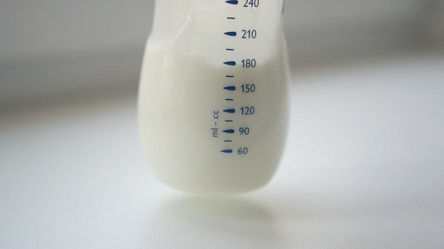 Milk in a baby bottle.