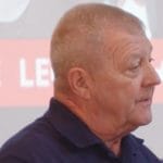 Man pictured from side looking in the distence.