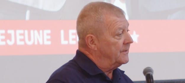 Man pictured from side looking in the distence.